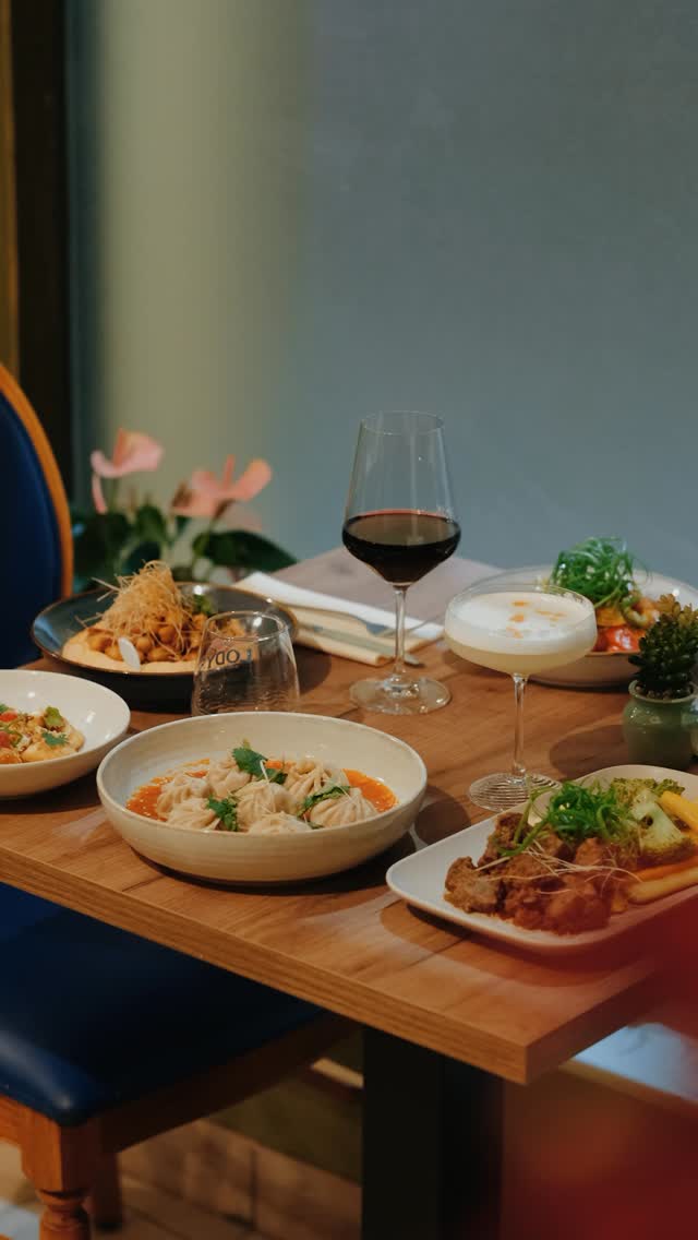 A spread of AAYAM dishes on the table