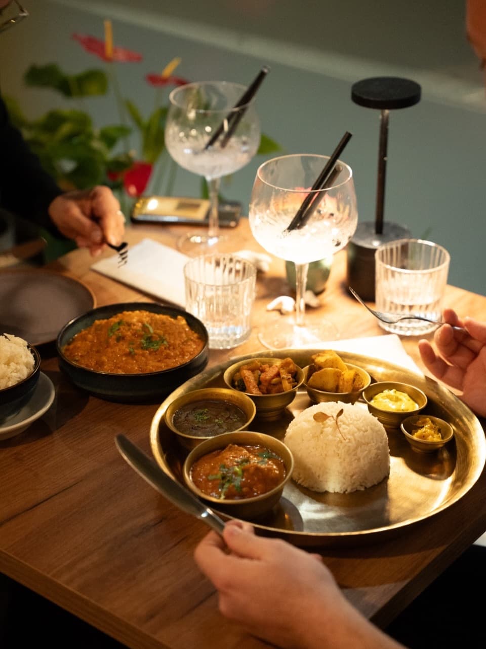 A table full of AAYAM dishes, made with care